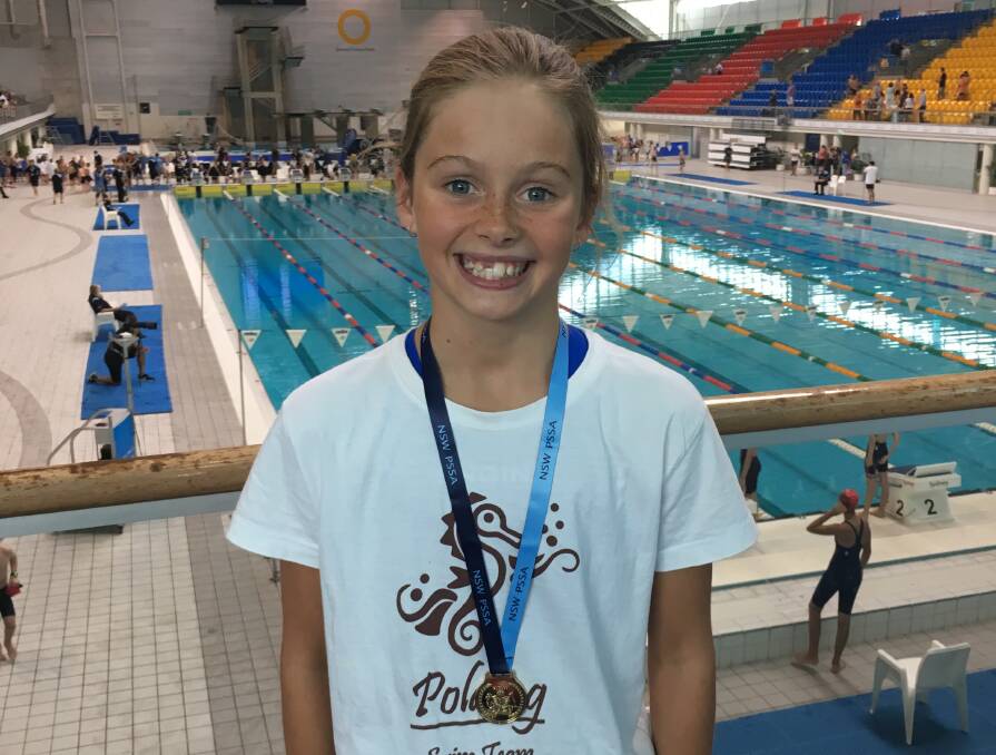 MAKING HER MARK: Warren's Maddie Marks is on her way to the School Pacific Games in Adelaide, after winning gold at the PSSA Swimming Championships. Photo: SUPPLIED