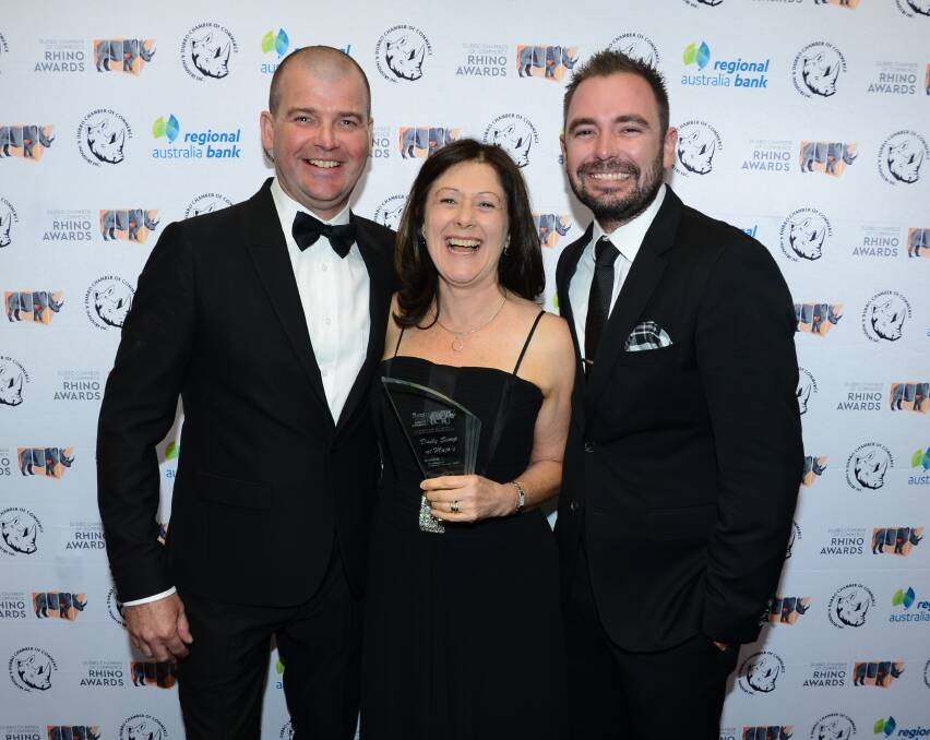 EXCELLENCE: Daily Scoop at Majo's proprietors Adam and Jo Campbell with award sponsor Ben Thompson (QantasLink). Photo: PAIGE WILLIAMS