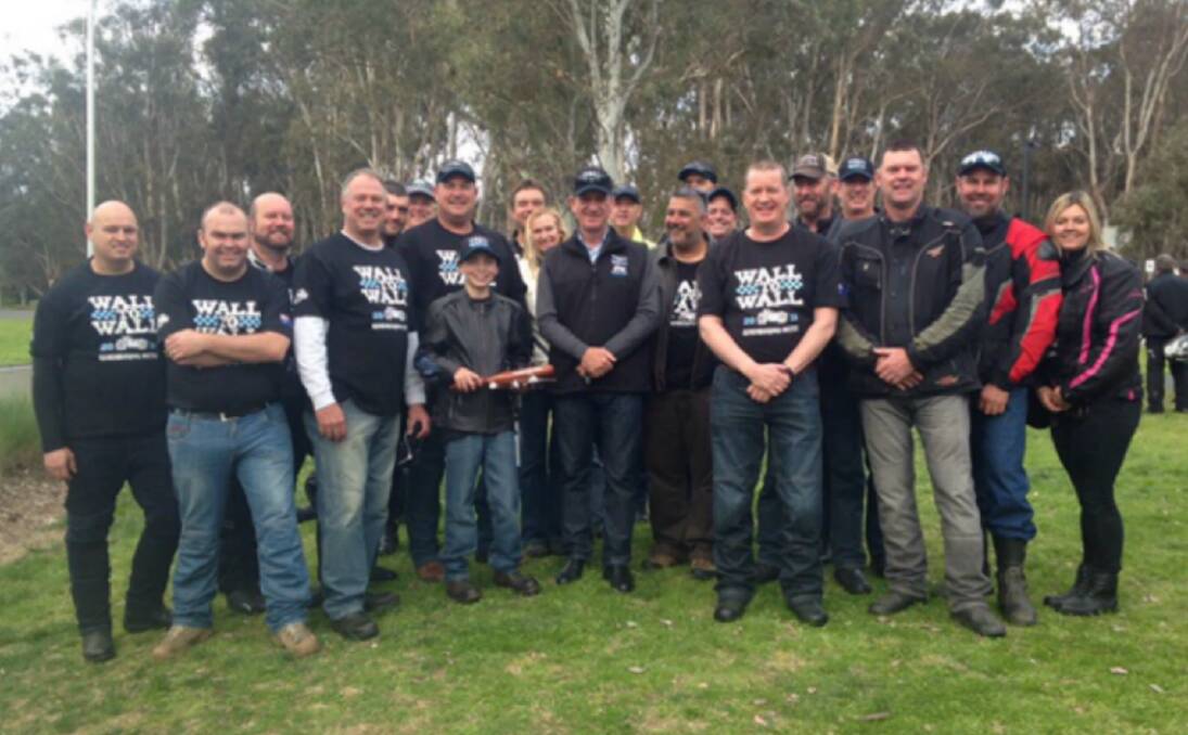 HONOURING MATES: NSW Police Commissioner Andrew Scipione (centre) with the contingent of riders from the NSW western region in the Wall to Wall: Ride for Remembrance 2016. Photo: CONTRIBUTED