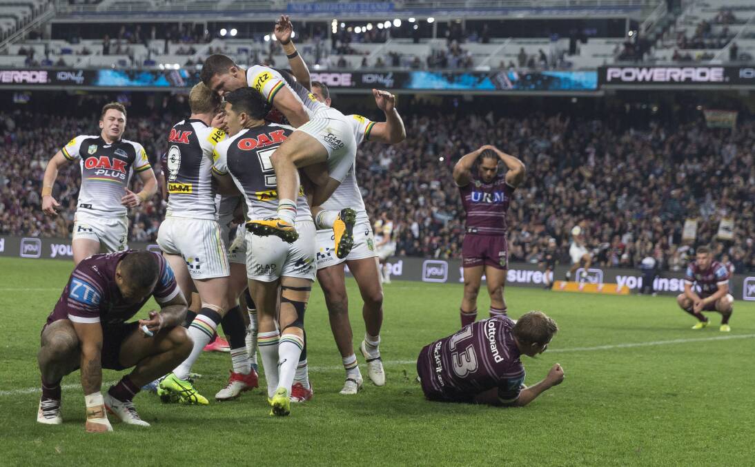 Celebrating Cartwright's match-winning try. Photo: CRAIG GOLDING/ AAP IMAGES