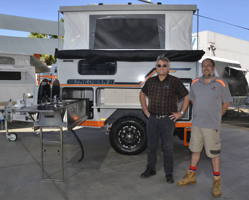 AUSTRALIAN MADE: Dubbo RV Centre sales manager Tim Wright and Kelly Campers sales manager Todd Burrows with the Glenrowan II. Photo: PAIGE WILLIAMS