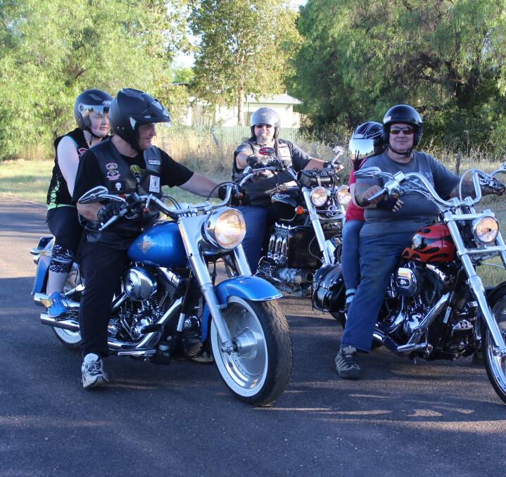 HIT THE ROAD: Bikers Australia Central West members Darrel Harvey and Ross Measley take Teagan and Ezeline Ferguson for a ride. Photos: REBECCA DOUGLAS