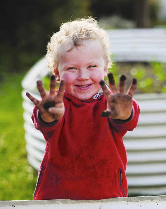 Down and dirty: All Mission Australia Centre's have outdoor learning and play areas so kids can interact and discover the environment around them. Photo: Supplied.