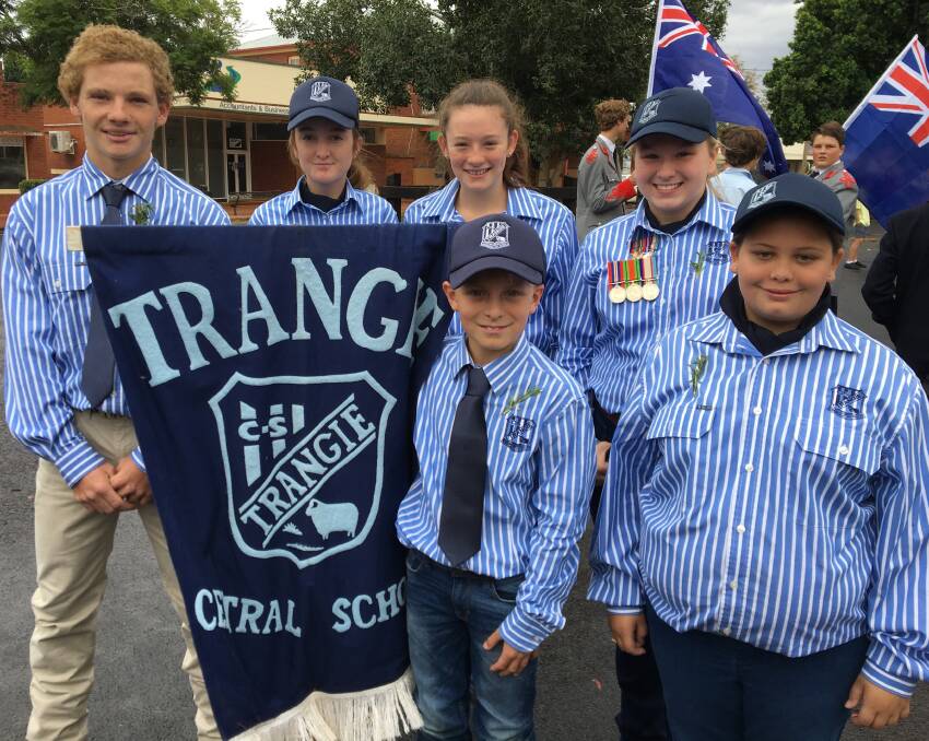 Pride: Trangie Central School's Cattle Team showing their respect marching at the Anzac Day Parade. Photo: Supplied.