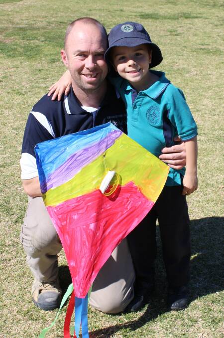 The sky is the limit: Toby and his dad celebrate Father’s Day at Orana Heights Public School with a day full of kite designiung, building and flying. Photo: Supplied.