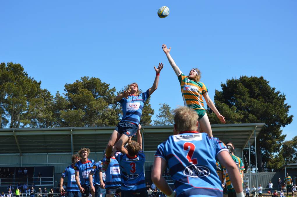 Dubbo s Jackson Squires and Orange City s Liam Tucknott contest a line-out during the former s preliminary final win on Saturday. 	Photo: MATT FINDLAY