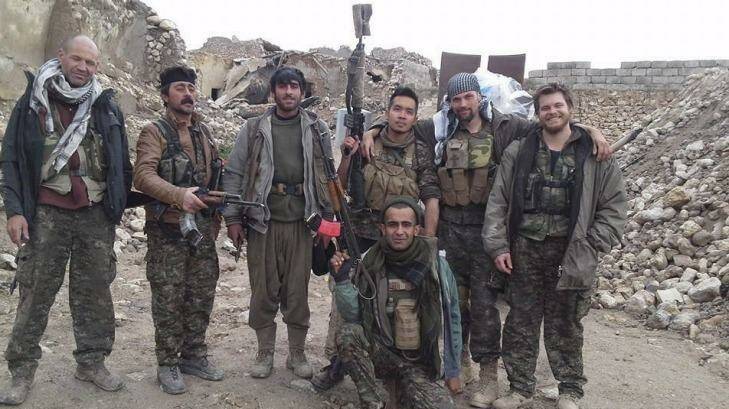 Ashley Johnston, far right, who was killed fighting Islamic State militants. Photo: Supplied
