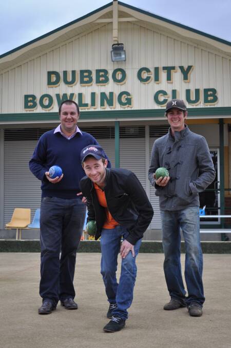Steward Todd Smith warming up for Saturday's charity bowls day with jockey Kody Nestor and trainer Clint Lundholm. 									 Photo: BEN WALKER