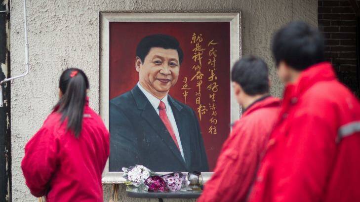 A painting of Xi Jinping on a Shanghai street. Photo: Olivia Martin-McGuire