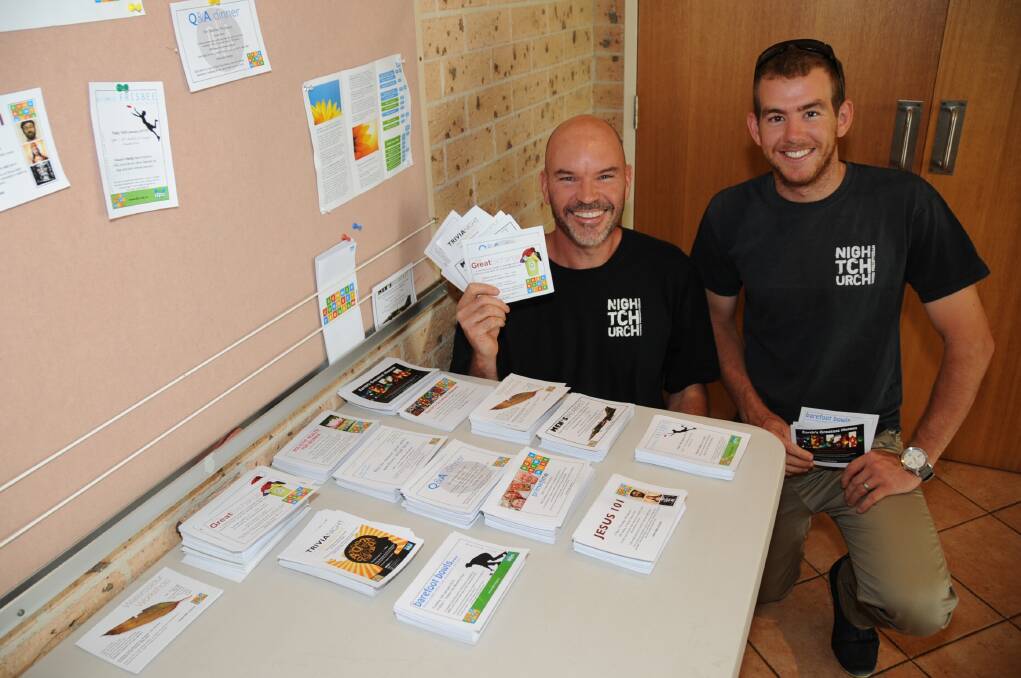Pastor Wayne Connor and Trainee Roger Knight with Dubbo Presbyterian Church activity pamphlets.     Photo: HANNAH SOOLE