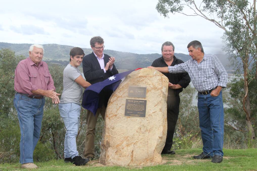 Garry Braithwaite, Bill Inwood's grandson Josh Fiske, Andrew Gee, Jason Kirk and Bill Inwood's son Mark Inwood at the Lion Island lookout for the unveiling of the plaque.