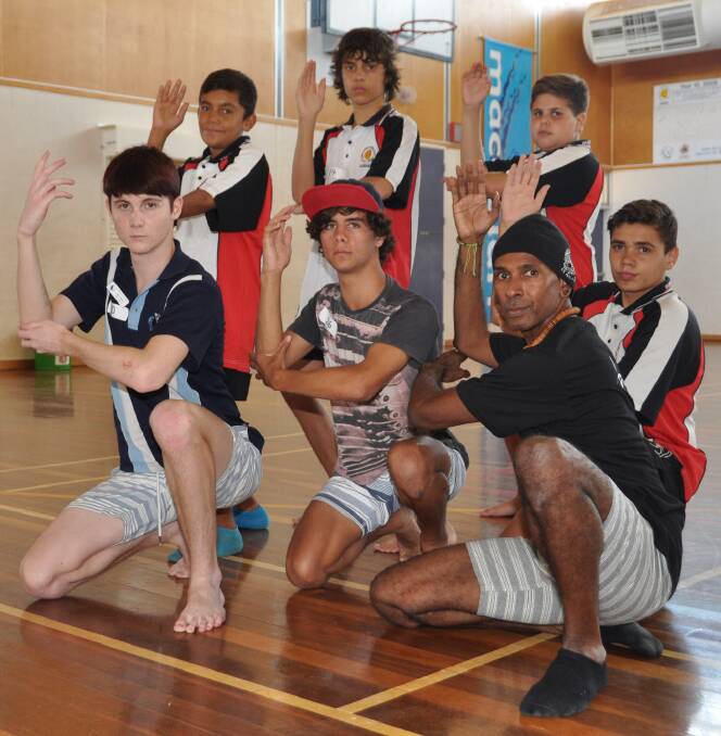 Patrick Thaiday from Bangarra Dance Theatre Works with Dubbo College students Traii Naden, Jordan Davis, Neil Towney, Jordan Everingham and Jay Carroll and Shane Rose from Bourke High School.