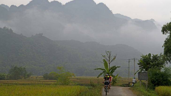 Cycling through rice fields near Mai Chau. Photo: Andrew Bain