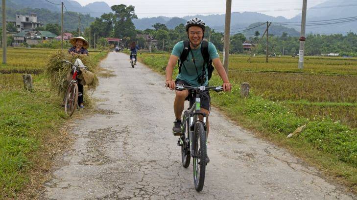 Cycling through the rice fields around Mai Chau. Photo: Andrew Bain