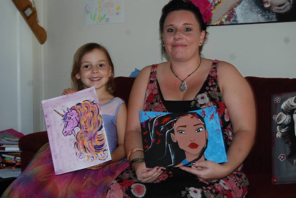 Sacha Whitehead, with her daughter Halli, painted more than 50 artworks during the month of April, raising more than $2000 for Parkinson's Disease research in the process.	       Photo: GRACE RYAN