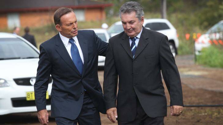 Russell Matheson with former prime minister Tony Abbott. Photo: Simon Bennett