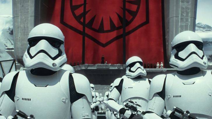 This photo provided by Disney shows Stormtroopers in a scene from the new film, "Star Wars: The Force Awakens," directed by J.J. Abrams. The movie releases in the U.S. on Dec. 18, 2015. (Film Frame/Disney/Lucasfilm via AP)