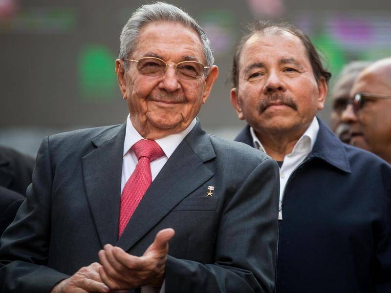 Cuba's legislative election will pave the way for a new president to succeed Raul Castro (left).