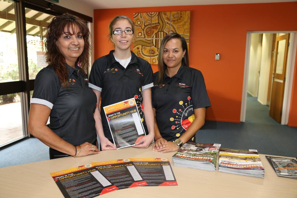 Ochre Opportunity Hub staff Coral Sampson (left) and Belinda Solomon (right) talk with student Halae Dennis (centre). 
Photo: Contributed