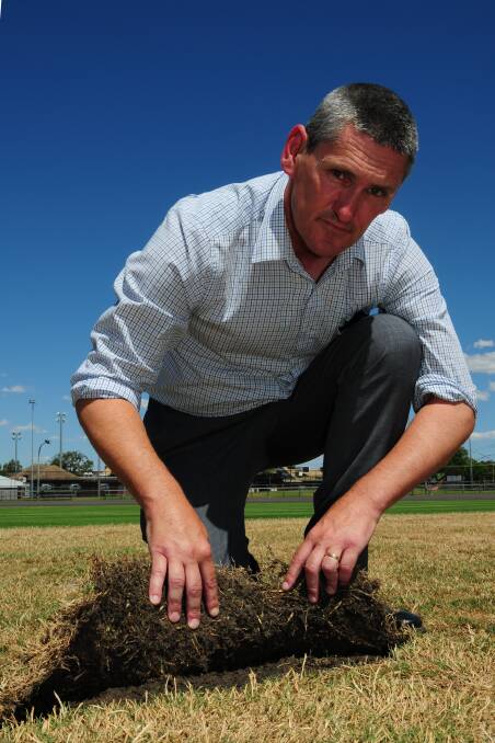 Dubbo City Council parks and landcare services director Murray Wood at the Victoria Park No. 1 Oval pitch that tested to have abnormally high toxicity in the soil, preventing new turf from growing. 
Photo: GREG KEEN