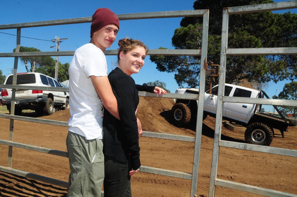 Jaycen Herbert and Naomi Carter get up close to the four-wheel drive action at the Orana Caravan, Camping, 4WD, Fish & Boat Show at the weekend. 											       Photo: CHERYL BURKE