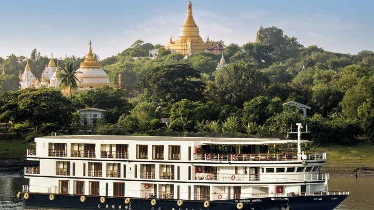 Sanctuary Ananda sails on the Irrawaddy River past Sagaing. Photo: Ken Hayden Photography
