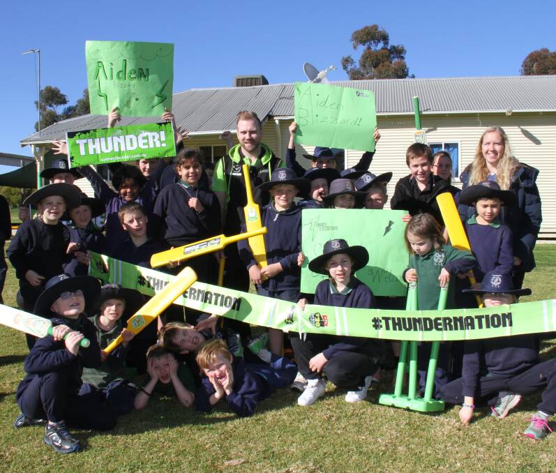 Aiden Blizzard with students from Burrabadine Christian School this week.  
Photo: CONTRIBUTED