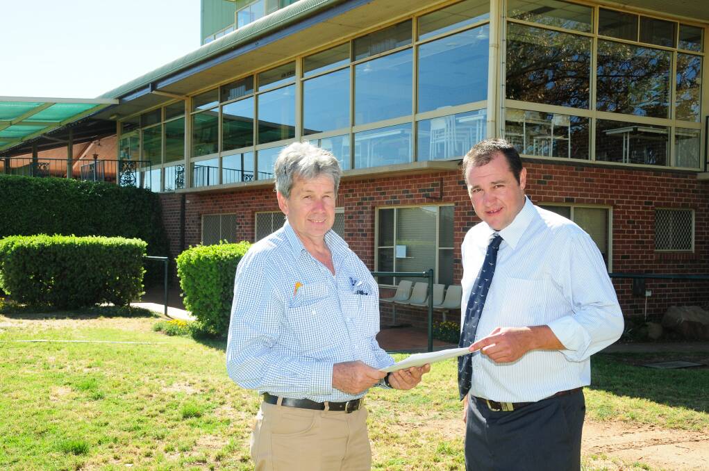 Chairman of Dubbo Turf Club Michael Edwards, seen here with Chairman of the Stewards Panel Todd Smith, has confirmed Racing NSW has allocated more than $1.5 million to the club. 	Photo: GREG KEEN