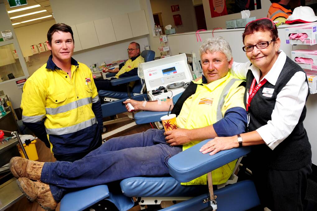 Scott Amos, Sam Clark and Scott MacLeod from Essential Energy with Kay Poulter from the Red Cross Donor Centre at Dubbo.