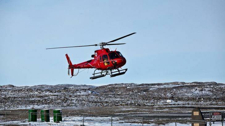 A helicopter pilot has been rescued after he fell down a crevasse on an ice sheet. Photo: David Barringhaus