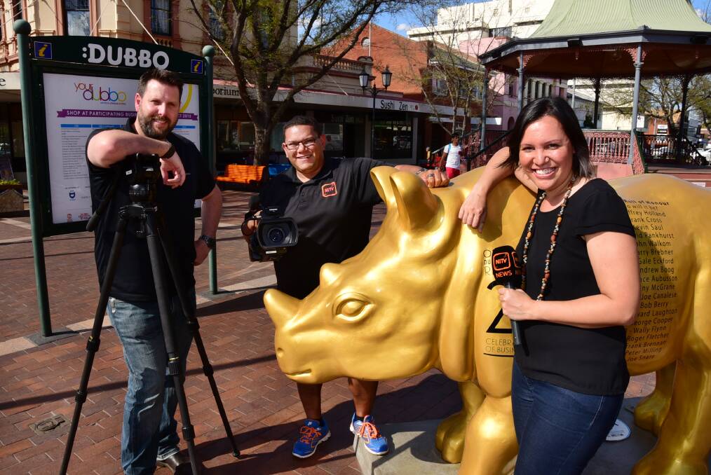 NITV producer Chris Roe, sports presenter Kris Flanders and news presenter Natalie Ahmat at the hang out at the Dubbo Rotunda on Tuesday ahead of the NSW Aboriginal Knockout.  
							  Photo: BELINDA SOOLE
