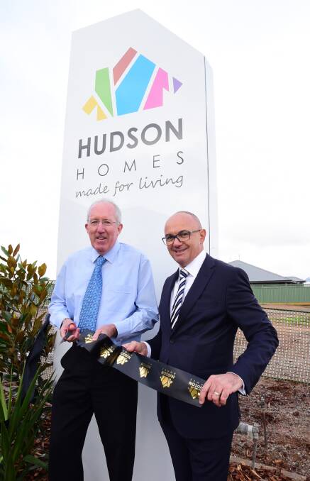 Western Plains Regional Council administrator Michael Kneipp and Hudson Homes general manager Robert Borg at the opening of Hudson Homes's display homes at Dubbo on Saturday. 									   Photo: BROOK KELLEHEAR-SMITH