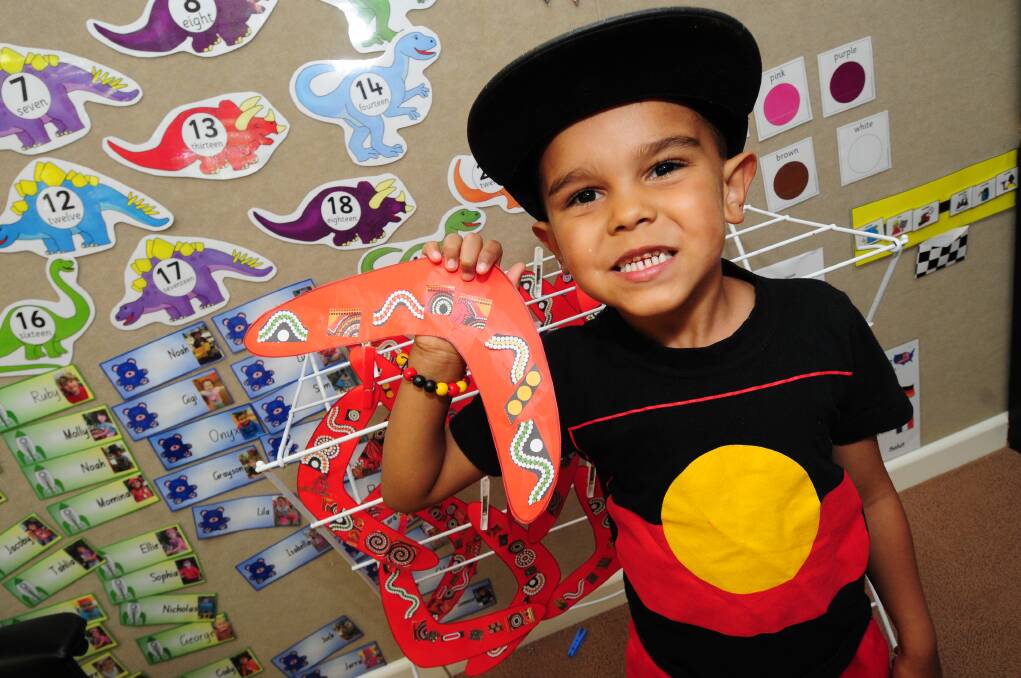Caison Duncan with his painted cardboard boomerang for the NAIDOC day celebrations at Dubbo West Preschool. 	  Photo: LOUISE DONGES