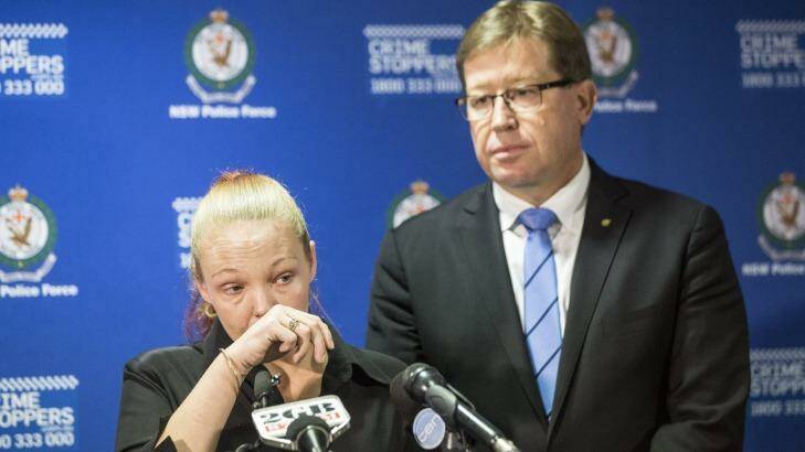   Police Minister Troy Grant and Graham Bourke's daughter, Lee, announce $100,000 reward for information leading to arrest over Mr Bourke's death. Photo: Jessica Hromas