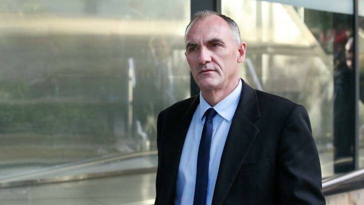 Michael Elliott leaves the Royal Commission in Newcastle after giving evidence on Thursday. Photo: Max Mason-Hubers