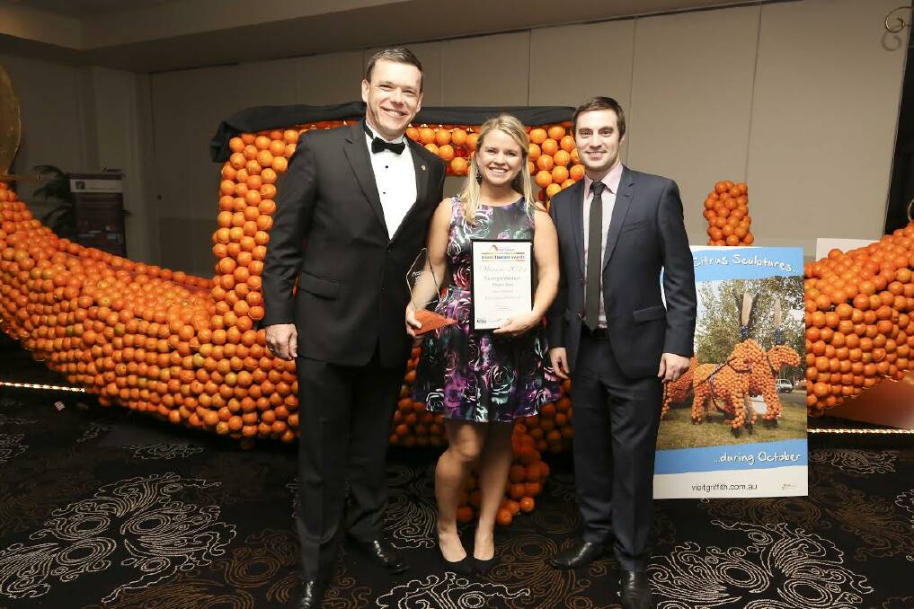 Taronga Western Plains Zoo general manager Matthew Fuller and public relations and promotions co-ordinator Mandy Turner were presented with the award for Best Digital Presence by Stuart Williams of Web Division.	Photo: Brett Naseby