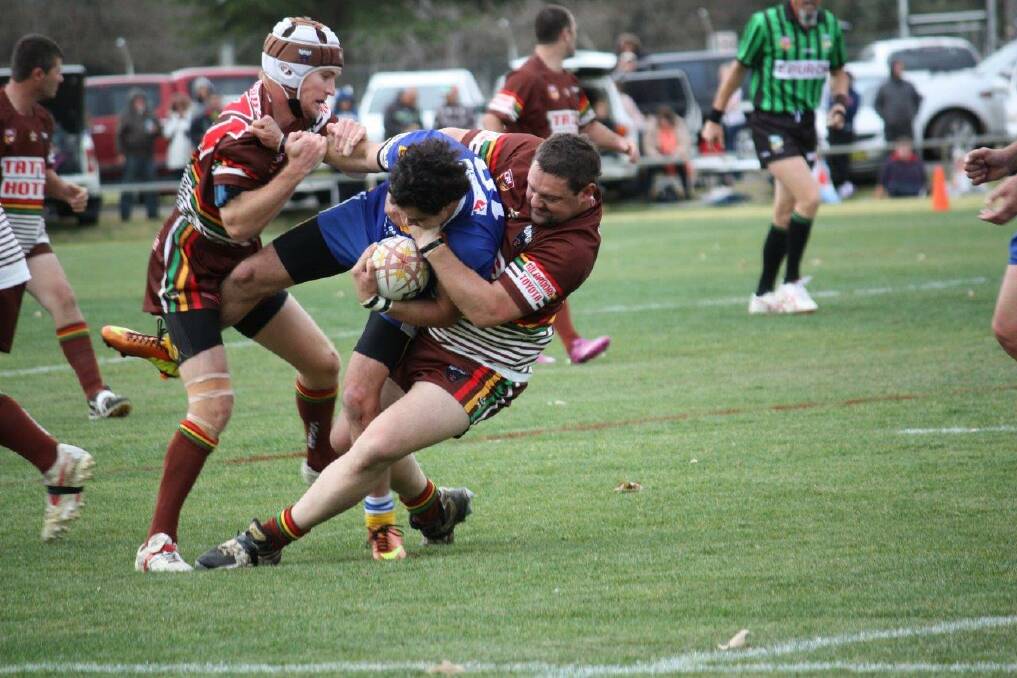 Gilgandra s Danial Riley muscles up in defence in last season s grand final against Coonabarabran. The two sides will meet again in round one this weekend.