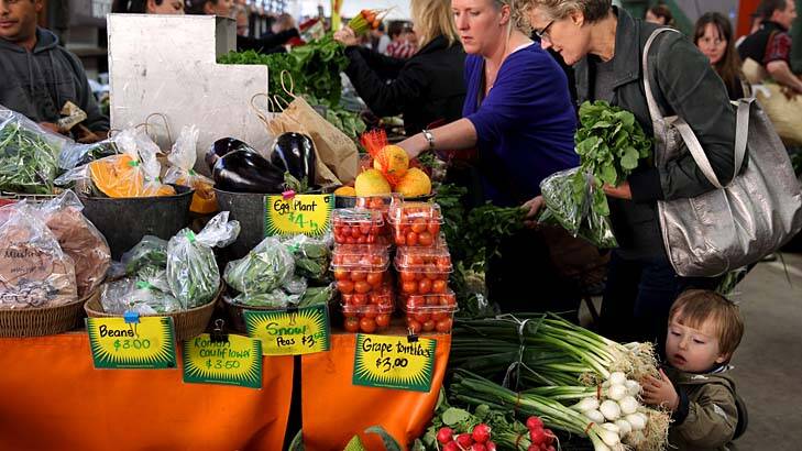 High standards: Owen Watkins, 1, checks the produce at Everleigh markets. Photo: Janie Barrett