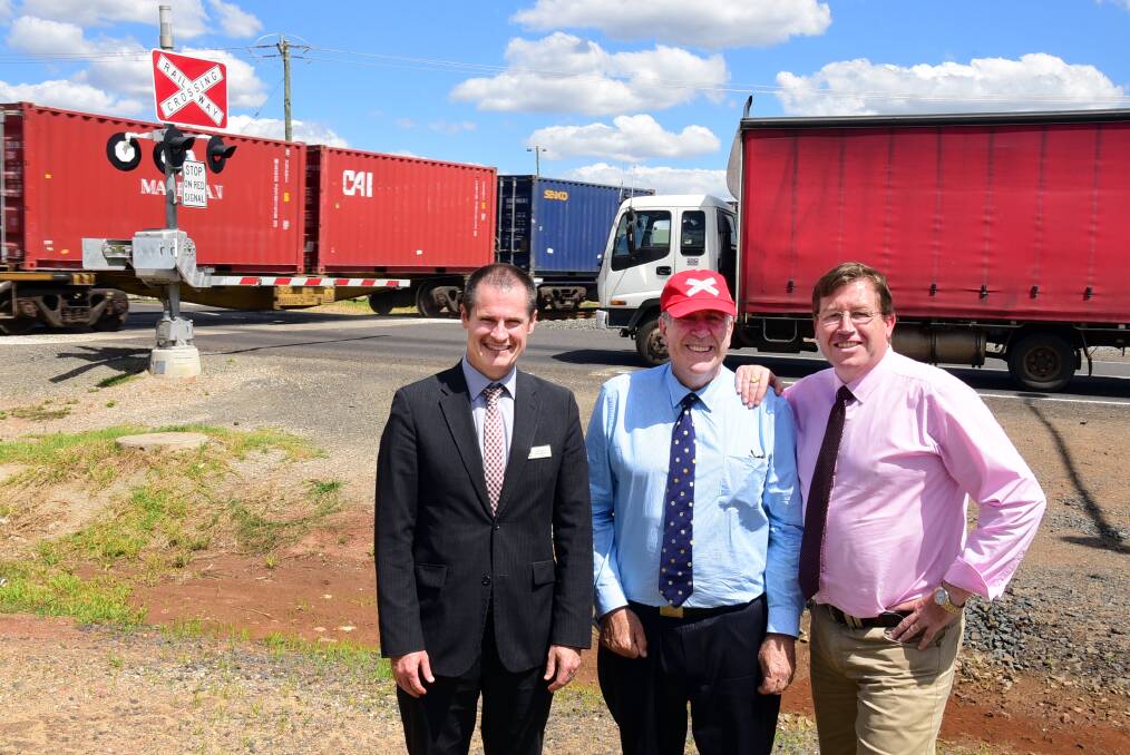 Dubbo mayor Mathew Dickerson, Roads and Freight Minister Duncan Gay and Dubbo MP Troy Grant officially opening the upgraded Troy Junction. Photo: BELINDA SOOLE