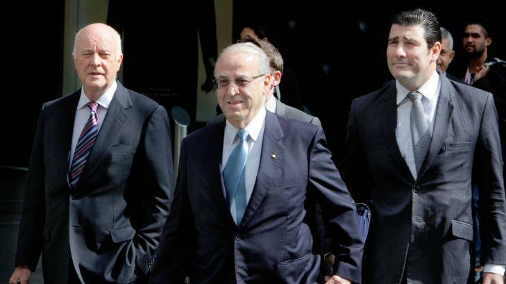Eddie Obeid arriving at the ICAC hearing flanked by his lawyers , including Stuart Littlemore, in 2013 Photo: Michele Mossop