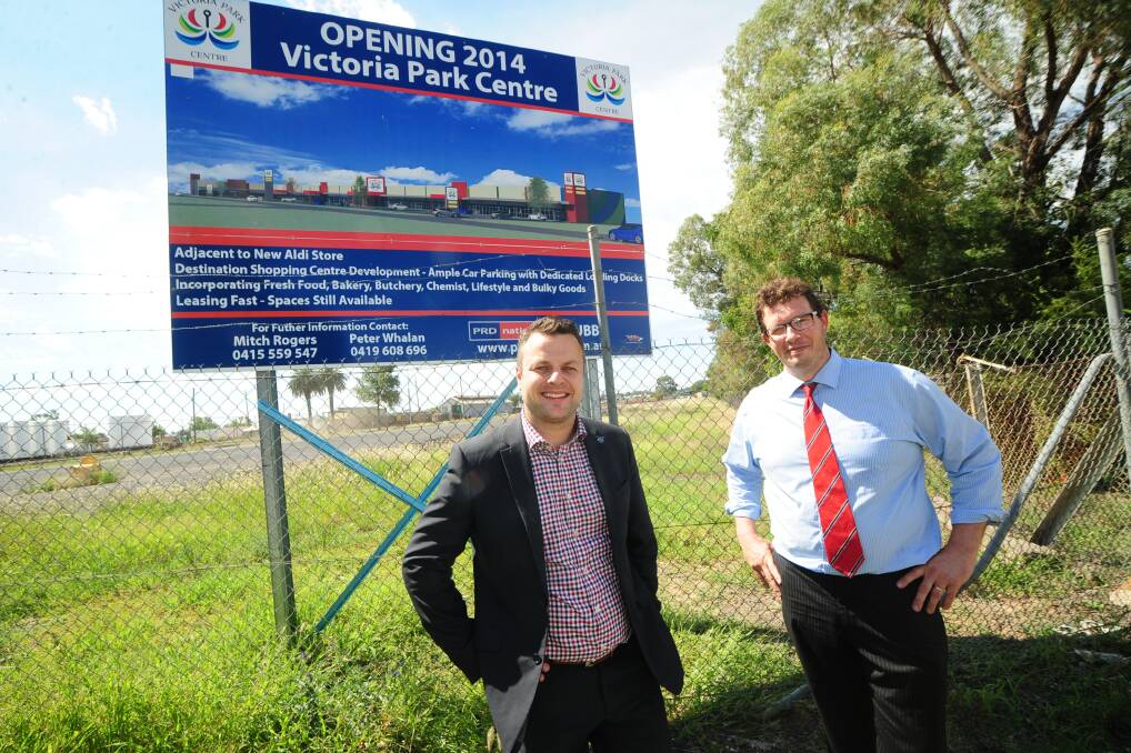Victoria Park Centre estate agent Laagan Whalan and colleague Matt Rendell at the site that could become home to a new cinema. Photo: BELINDA SOOLE