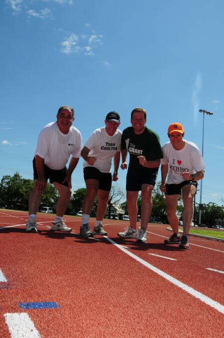 John Walkom, Mark Coulton, Troy Grant and Mathew Dickerson get ready for the relay race at the Barden Park Centre for Excellence for Athletics official opening.                                                 Photo: GREG KEEN