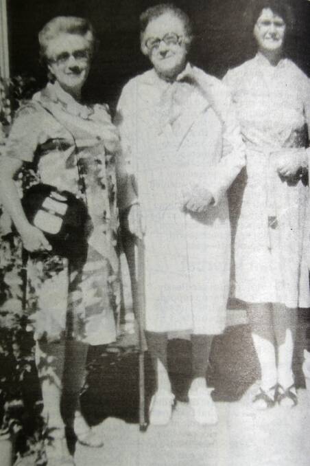 Mary Quy (left) pictured with her late mother Ruby Linnane and sister-in-law Anne Linnane on the steps of her former home in Cobra Street, Dubbo.  
Photo: FILE