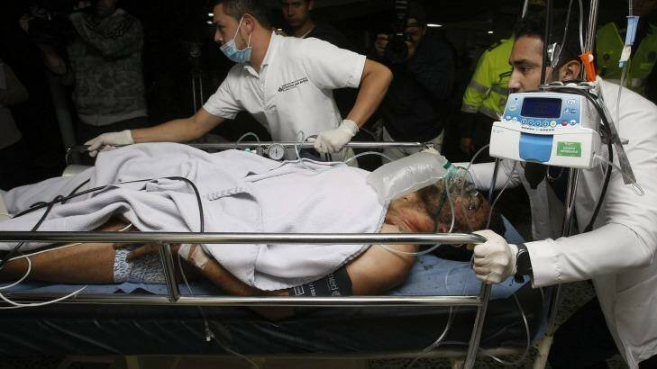 Chapecoense player Alan Ruschel is treated at hospital after surviving the plane crash.  Photo: EPA