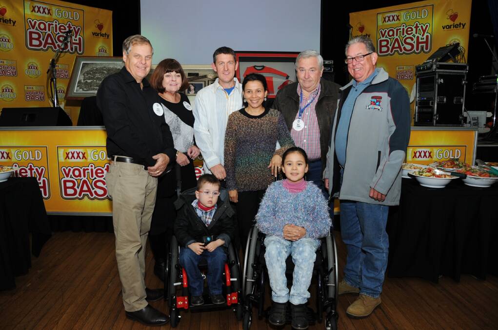 Bob Male, Helena Patriarca, Ashley and Venicia Bush, Ray Tobin, Rob Goodwin with Finley (four years old) and Nioka Bush (eight years old) at the Rotary Club of South Dubbo and Queensland Variety Bash dinner. 								Photo: BELINDA SOOLE