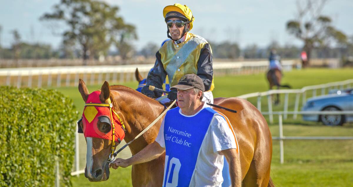 Trainer Mark Jones leads around one his runners, being ridden by jockey Anthony Cavallo. 	  Photo: JANIAN McMILLAN (www.racingphotography.com.au)