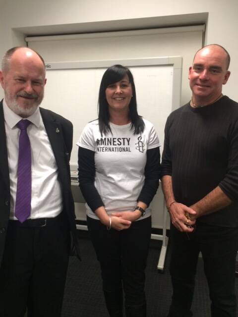 Leaders of the new Dubbo Amnesty International Group, Terence Duff of Coonamble and Kylie Jones of Dubbo, catch up with Amnesty International Australia community organiser Bede Carmody. 	    Photo: CONTRIBUTED