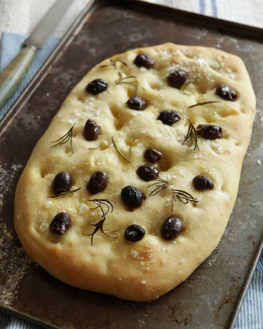 Foccacia with olives and rosemary <a href="http://www.goodfood.com.au/good-food/cook/recipe/focaccia-with-olives-and-rosemary-20111018-29x2o.html"><b>(recipe here).</b></a> Photo: Marina Oliphant
