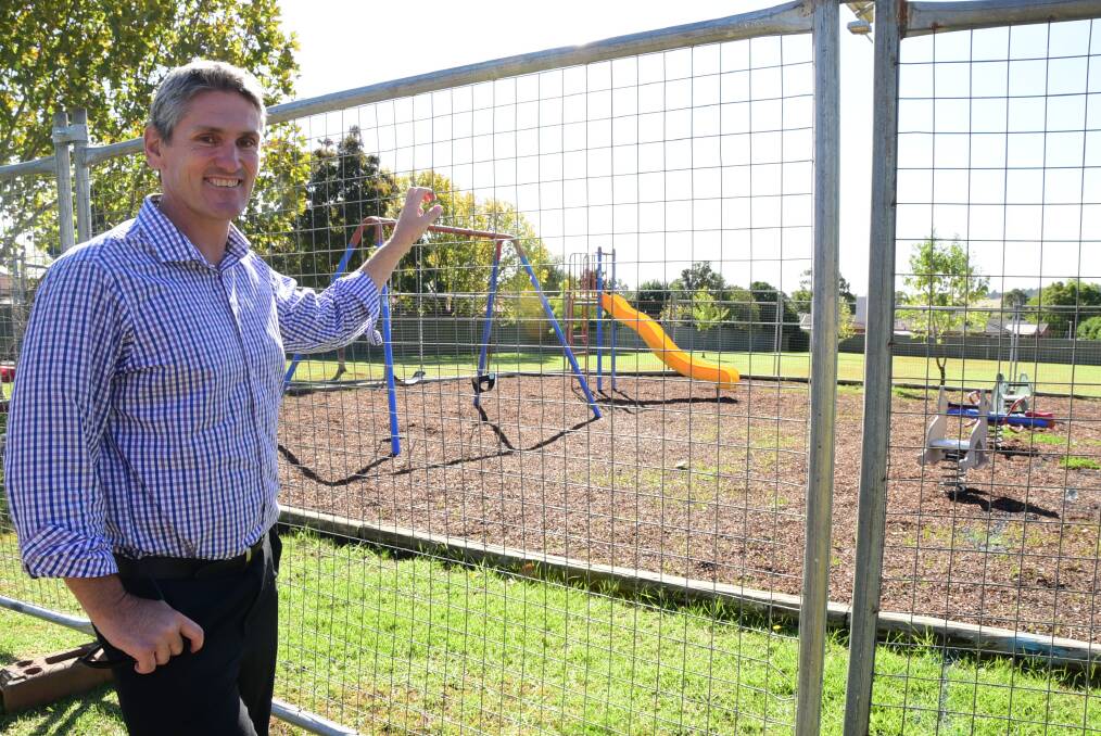 Dubbo City Council s director parks and landcare Murray Wood surveys the playground in Jack William Drive earmarked for a $50,000 makeover.  
Photo: BELINDA SOOLE