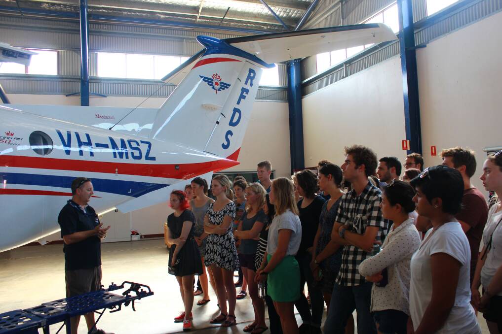 RFDS Dubbo Base Manager Darren Schiller talking to the University of Sydney students about the planes and the important work the service provides. Photo supplied.